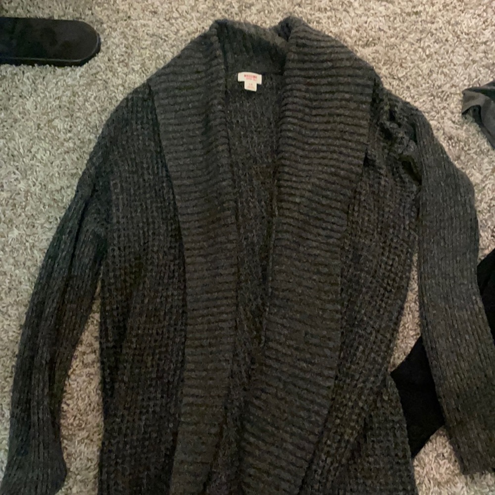 Long, grey, blanket style cardigan.